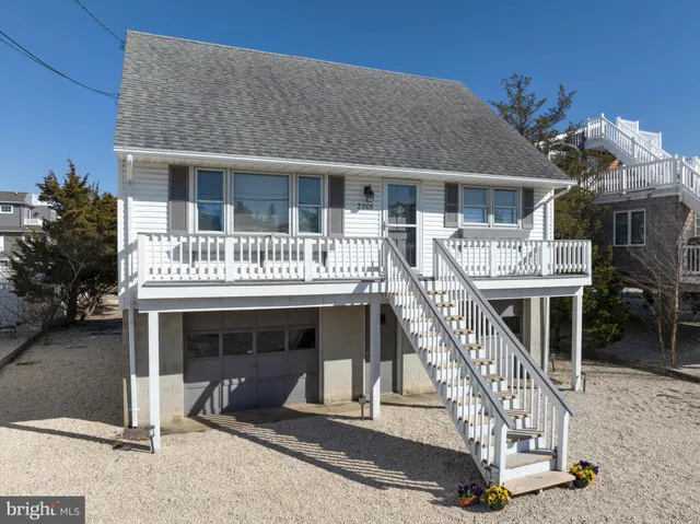 a front view of a house with a balcony