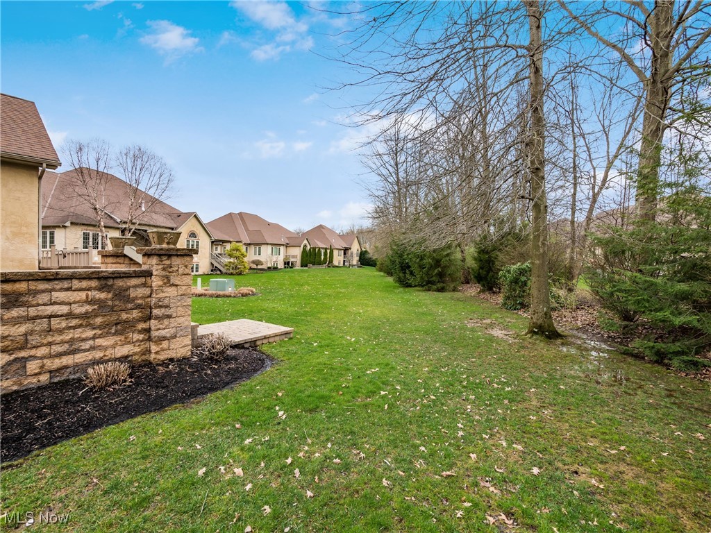5349 Slater Ridge Westerville, OH 43082 - Photo 42 of 50 View of grassy yard with a residential view