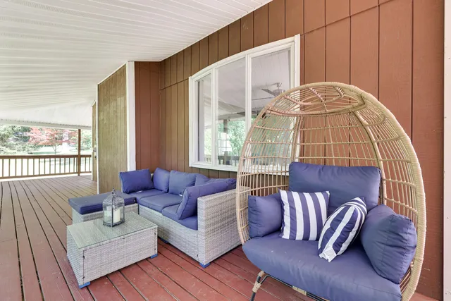 a front view of a house with wooden floor