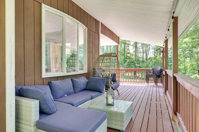 a view of a chairs and table in the garden