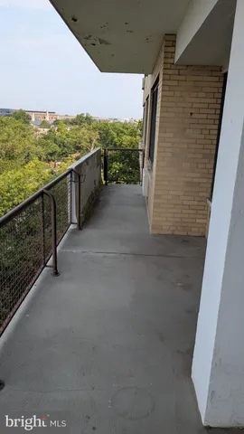 a view of a terrace with city view