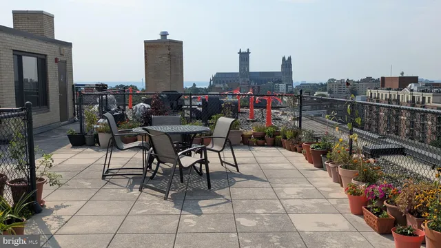 a view of a city with tall buildings