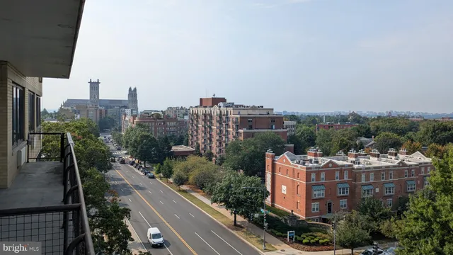 a view of a city with tall buildings