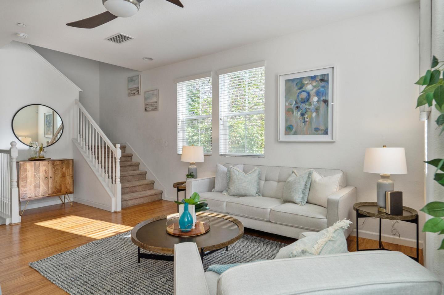 650 Macabee Way Hayward, CA 94541 - Photo 13 of 73 a living room with furniture and a wooden floor