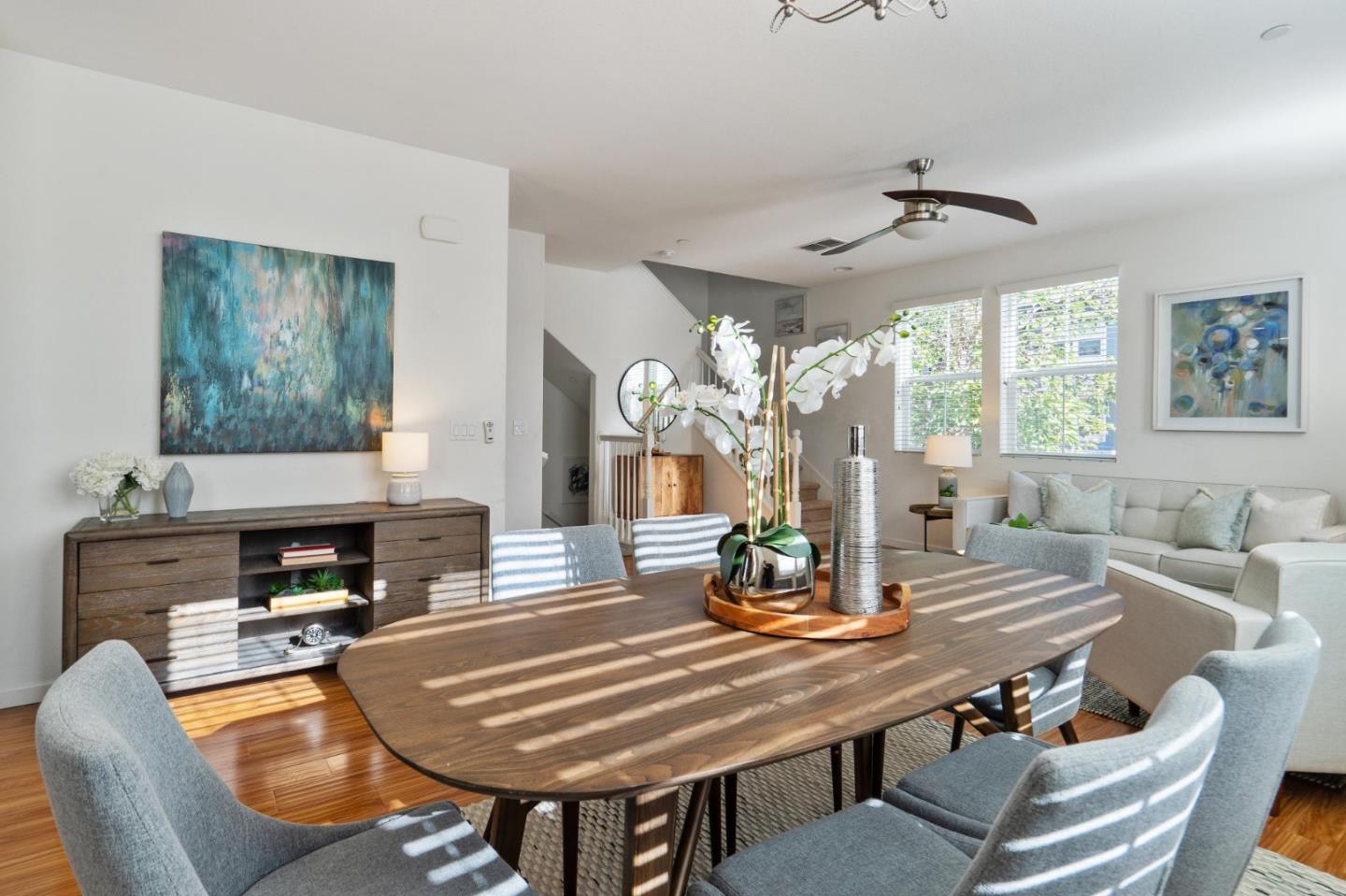 650 Macabee Way Hayward, CA 94541 - Photo 20 of 73 a living room with furniture and a chandelier