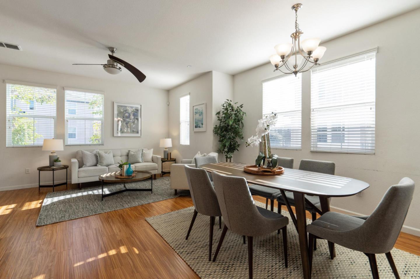 650 Macabee Way Hayward, CA 94541 - Photo 21 of 73 a view of a dining room with furniture window and wooden floor
