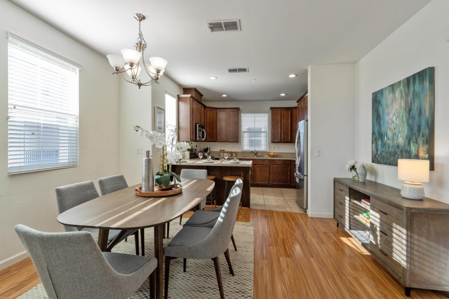 650 Macabee Way Hayward, CA 94541 - Photo 23 of 73 a view of a dining room with furniture and wooden floor