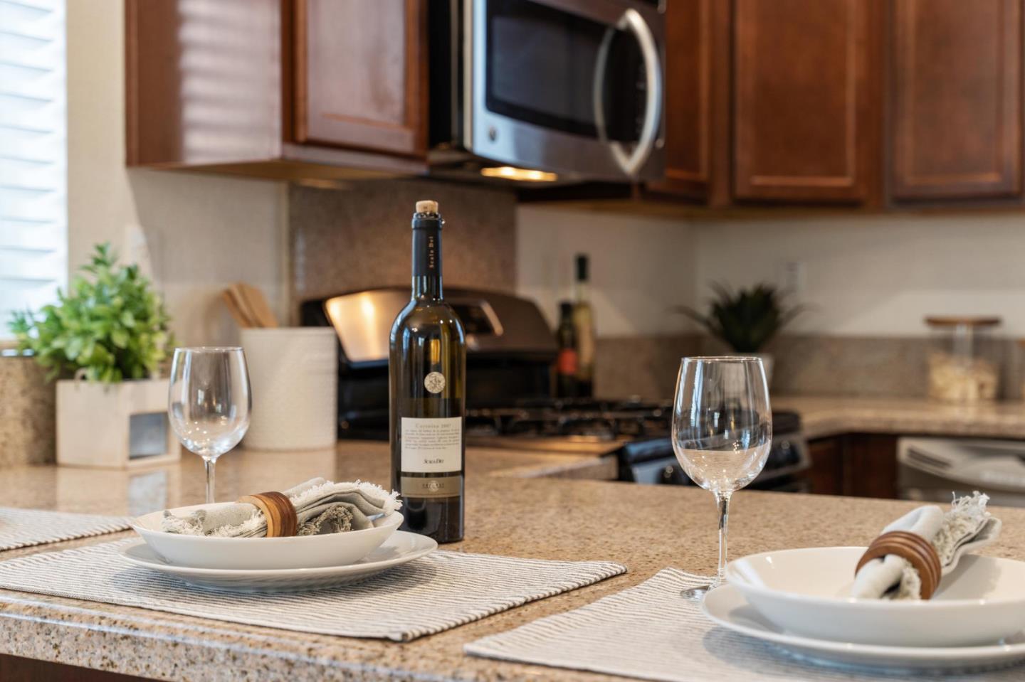 650 Macabee Way Hayward, CA 94541 - Photo 26 of 73 a kitchen with a stove and a wooden floor