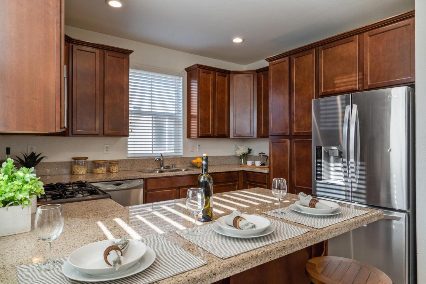 650 Macabee Way Hayward, CA 94541 - Photo 27 of 73 a kitchen with appliances a sink and cabinets