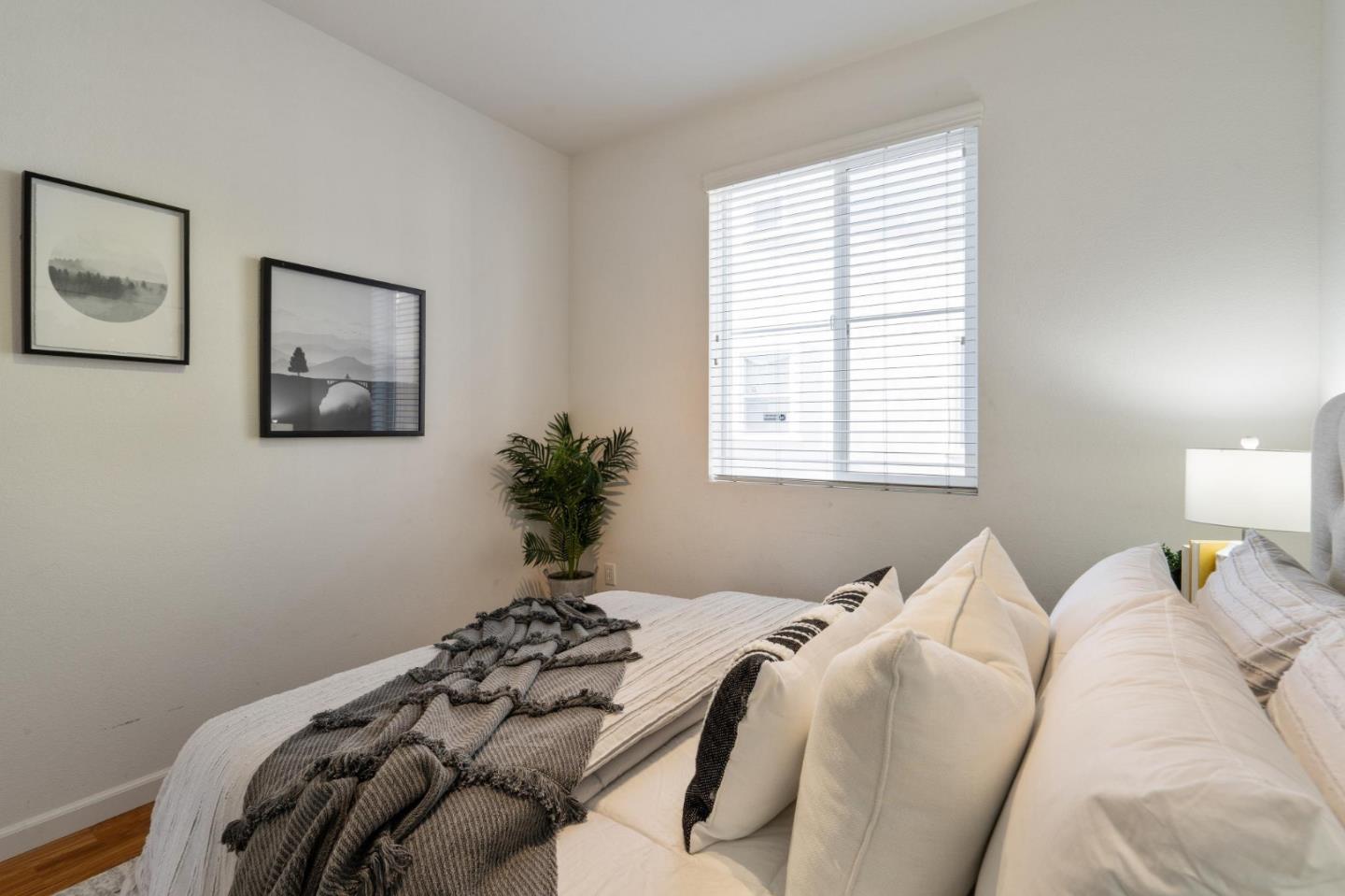 650 Macabee Way Hayward, CA 94541 - Photo 35 of 73 a bedroom with a bed and a window