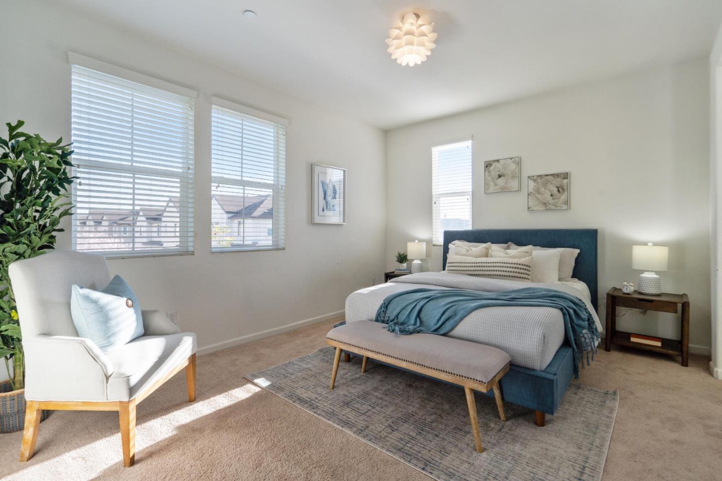 650 Macabee Way Hayward, CA 94541 - Photo 39 of 73 a bedroom with a bed and a chair