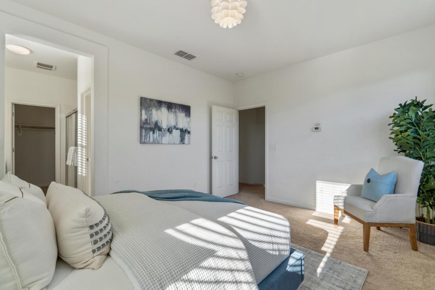 650 Macabee Way Hayward, CA 94541 - Photo 42 of 73 a bedroom with a bed and chair