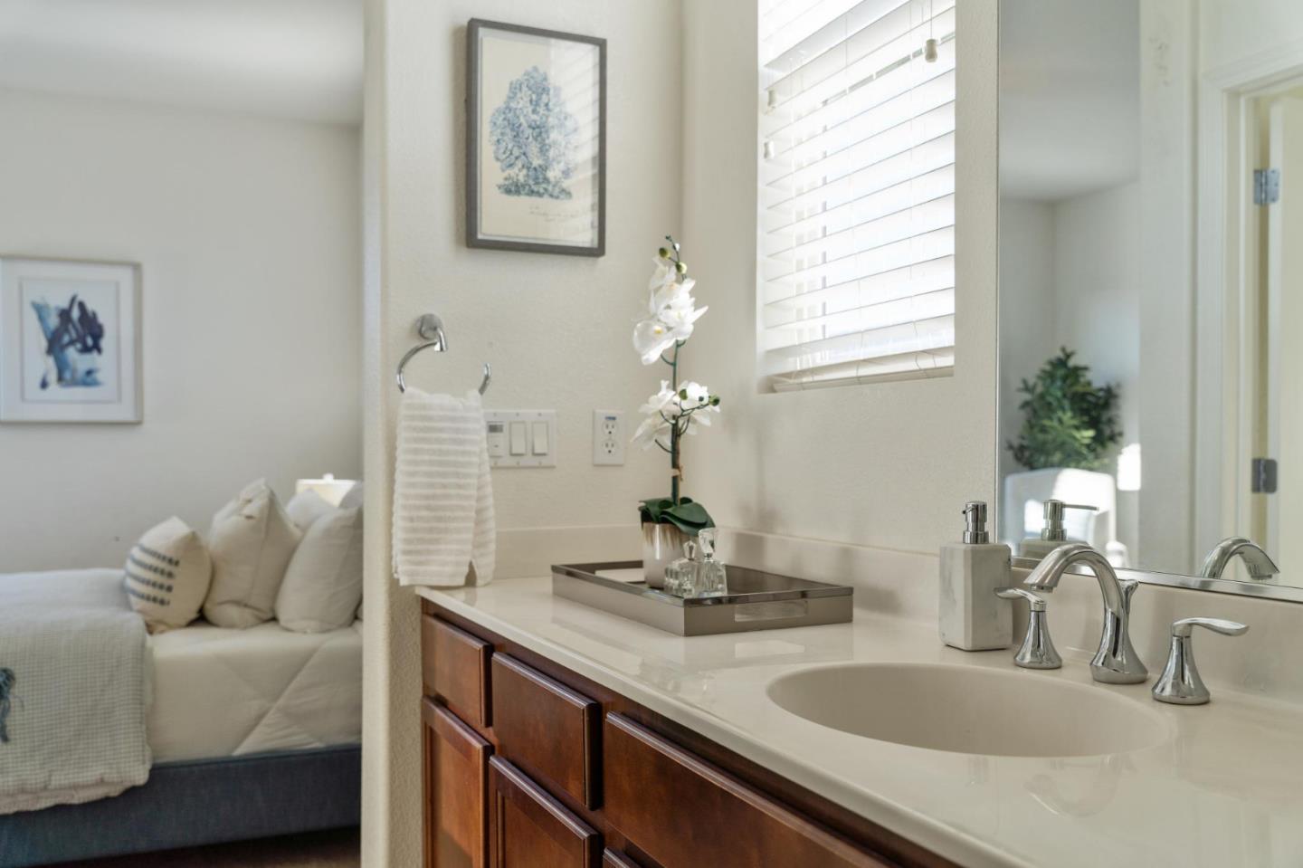650 Macabee Way Hayward, CA 94541 - Photo 47 of 73 a bathroom with a sink and a mirror
