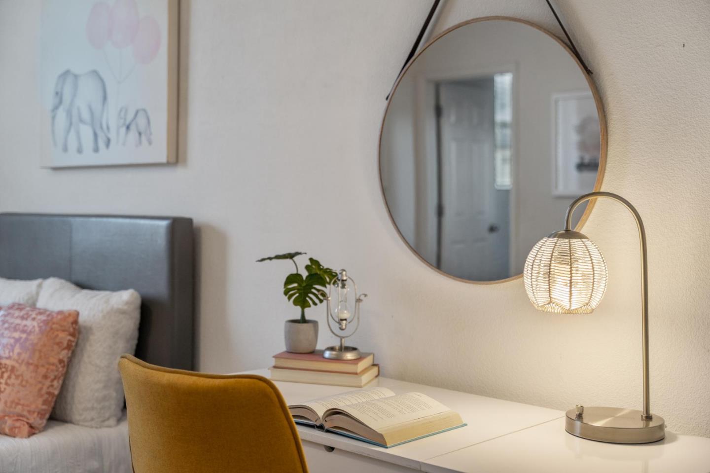 650 Macabee Way Hayward, CA 94541 - Photo 55 of 73 a room with a mirror and a potted plant