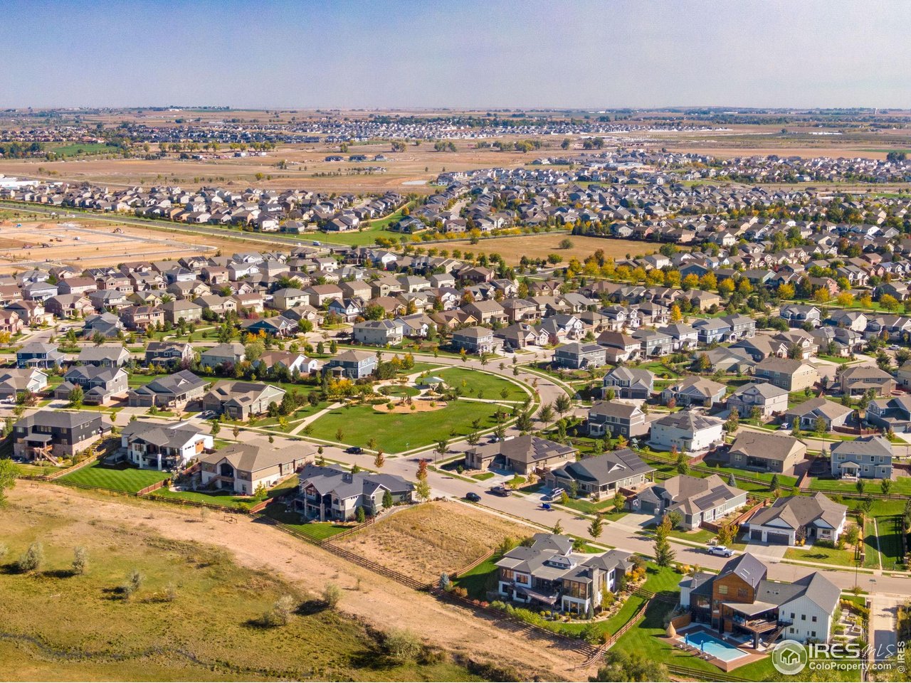 5901 Riverbluff Drive Timnath, CO 80547 - Photo 12 of 13 an aerial view of residential building and parking space