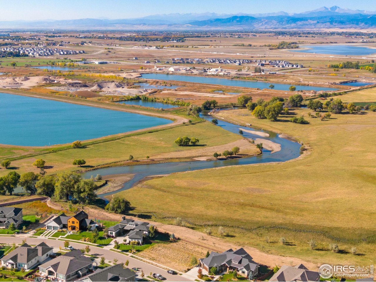 5901 Riverbluff Drive Timnath, CO 80547 - Photo 2 of 13 a view of an ocean and beach