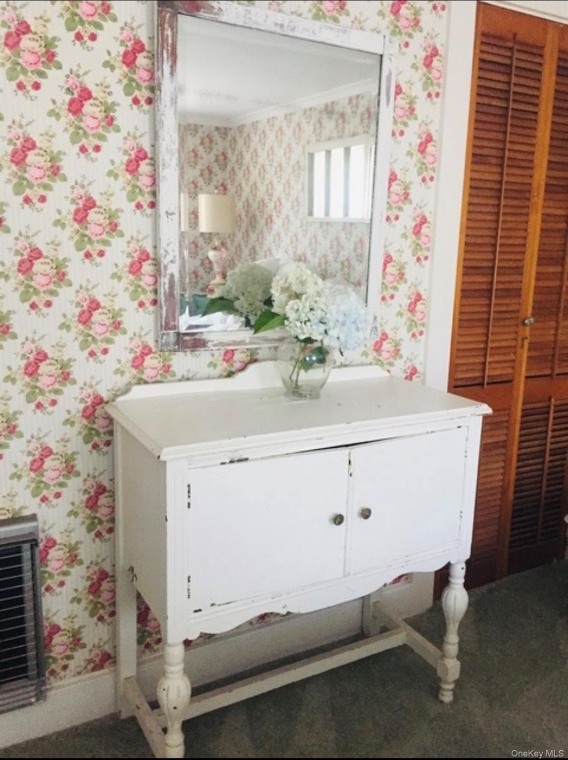 179 G Springville Road Hampton Bays, NY 11946 - Photo 16 of 45 Bathroom featuring wallpapered walls and vanity