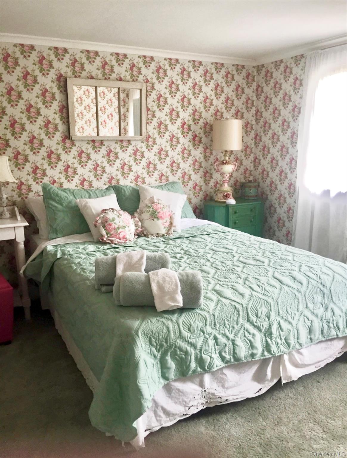 179 G Springville Road Hampton Bays, NY 11946 - Photo 19 of 45 Bedroom featuring wallpapered walls, carpet flooring, and crown molding