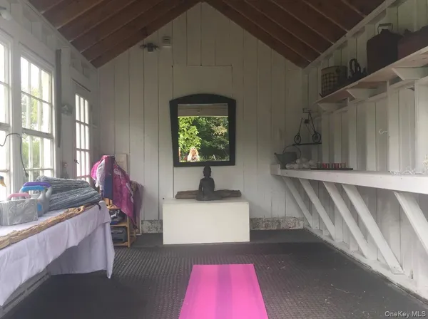 a outdoor view of a garden with seating space