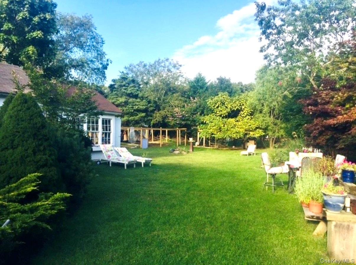 179 G Springville Road Hampton Bays, NY 11946 - Photo 37 of 45 View of grassy yard