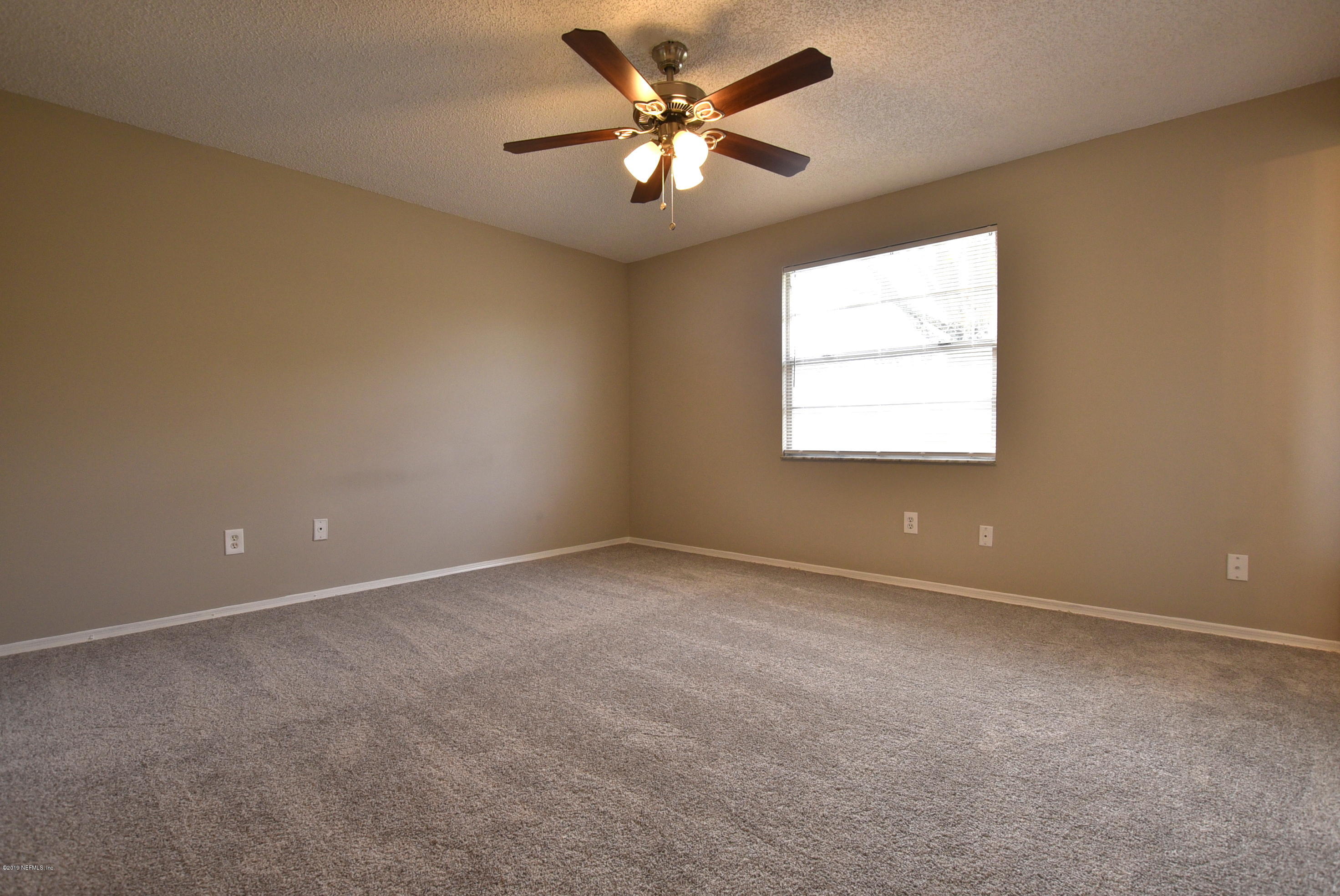 8166 Justin Road South Jacksonville, FL 32210 - Photo 13 of 21 Master Bedroom