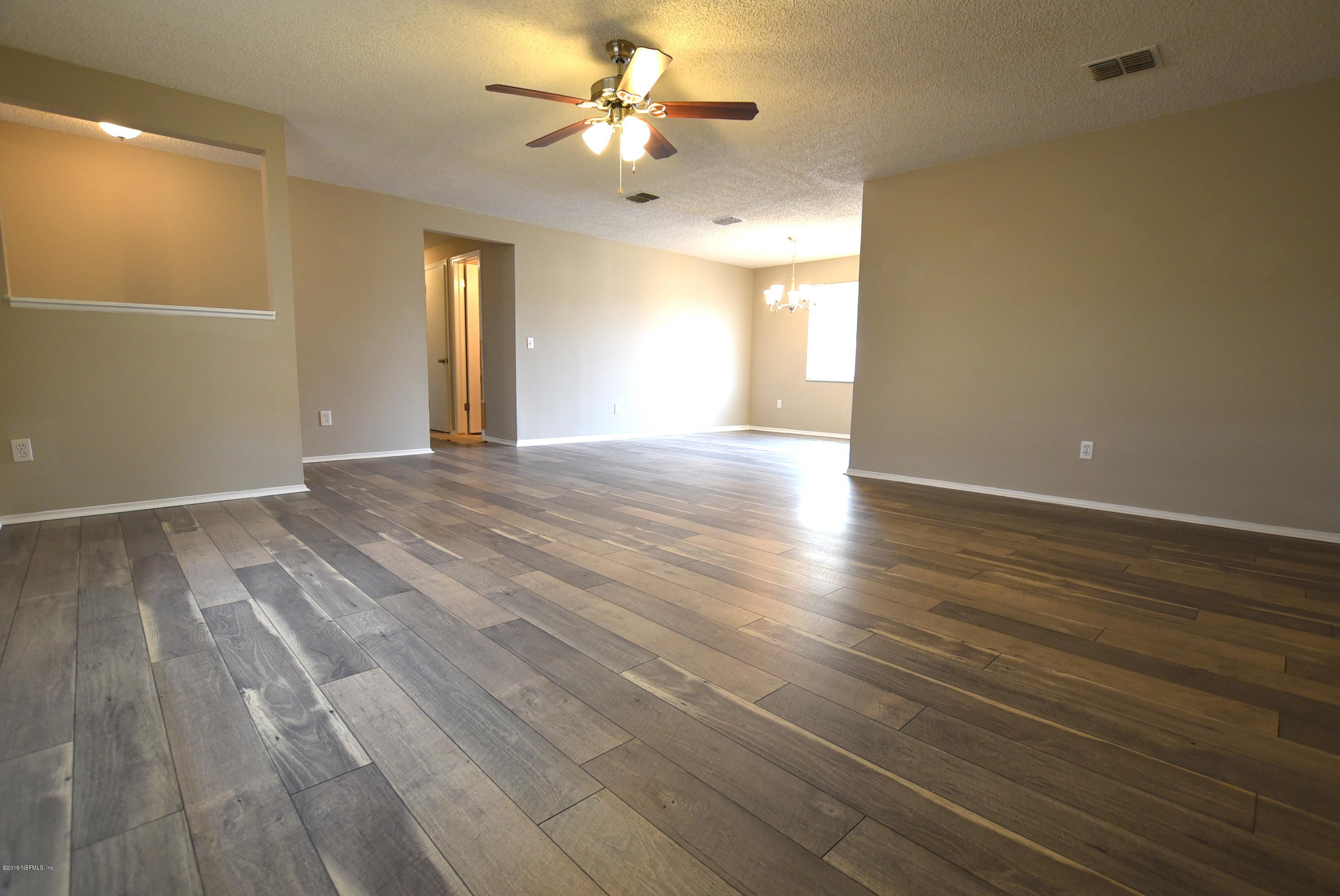 8166 Justin Road South Jacksonville, FL 32210 - Photo 6 of 21 Living Room 2