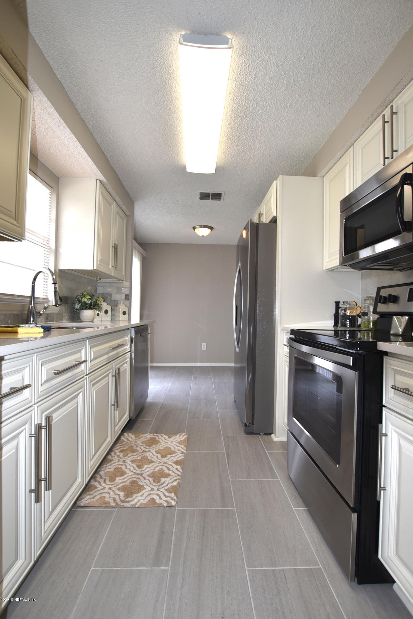 8166 Justin Road South Jacksonville, FL 32210 - Photo 9 of 21 Kitchen 3