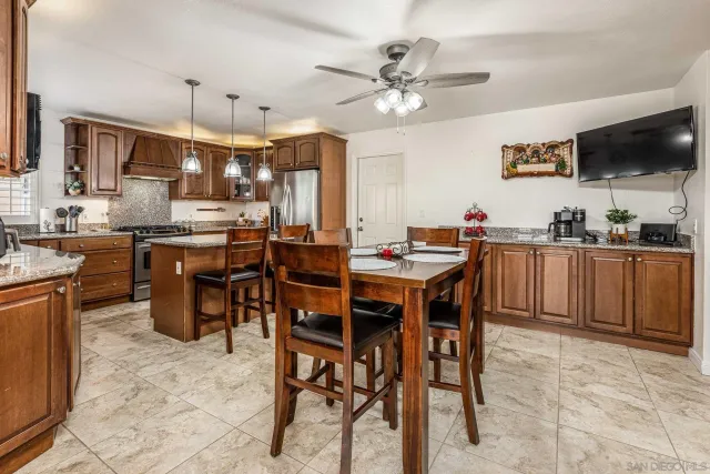a view of a dining room kitchen and a window