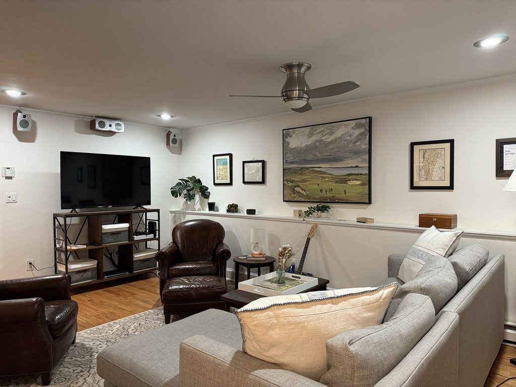 519 Columbus Avenue, Unit 1 Boston, MA 02118 - Photo 4 of 10 a living room with furniture and a flat screen tv