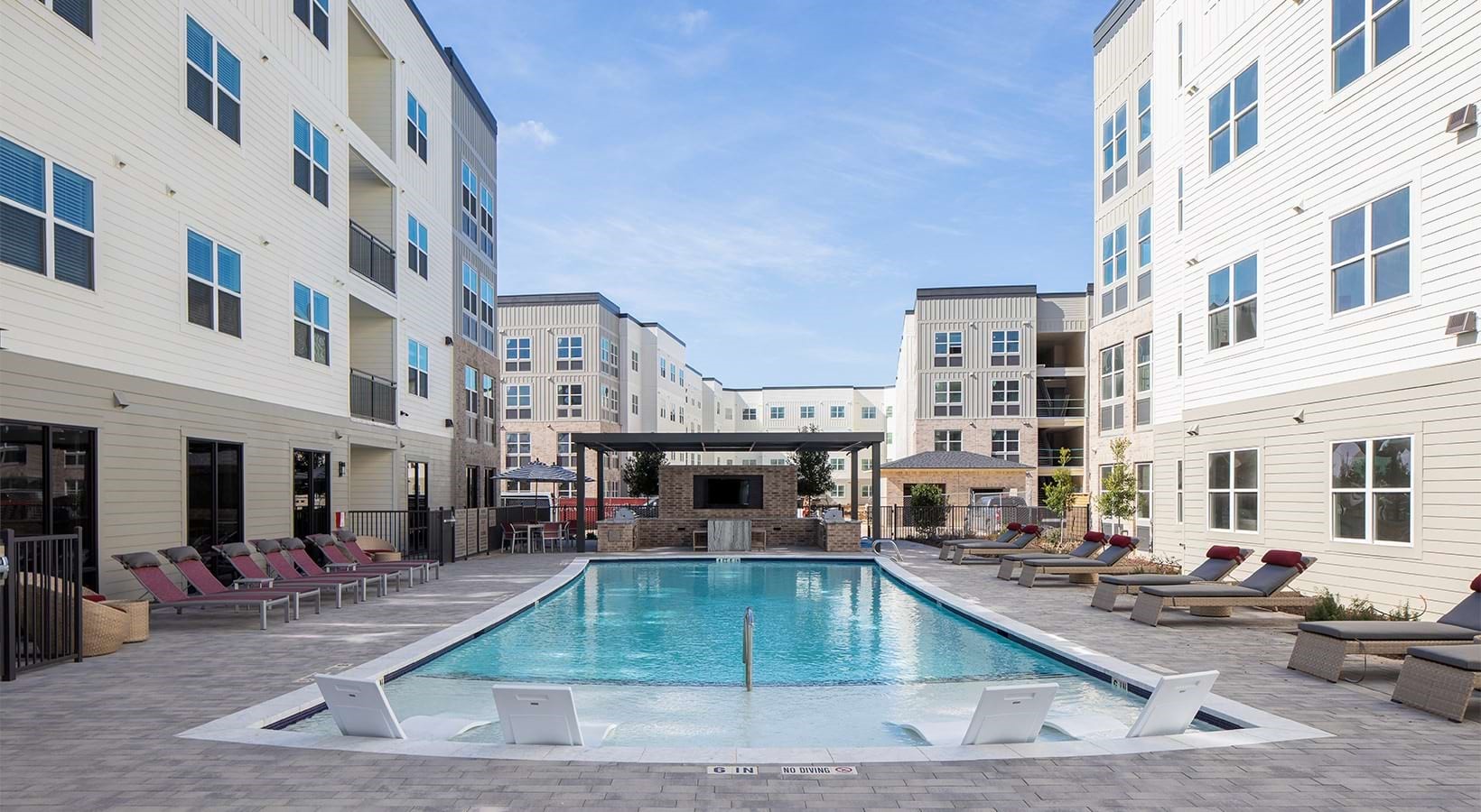 22540 Merchants Way, Unit 21135 Katy, TX 77449 - Photo 13 of 16 a view of a building with a swimming pool