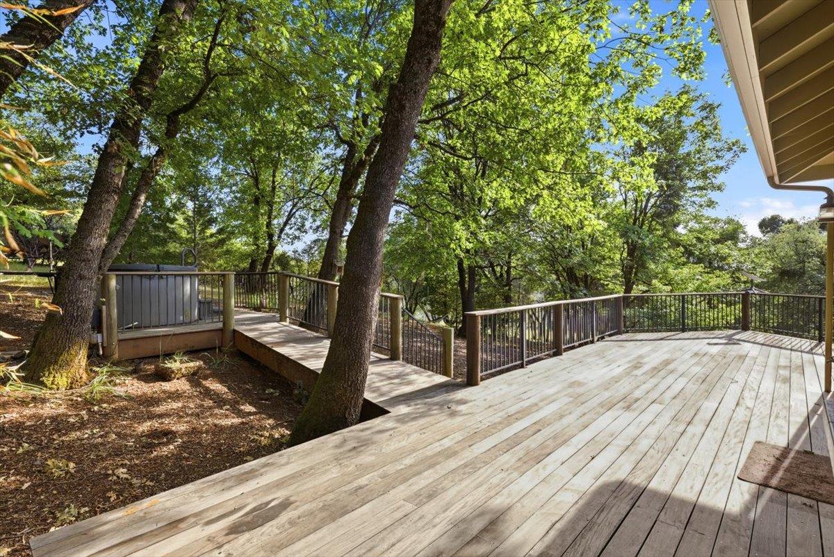 12531 Lowhills Road Nevada City, CA 95959 - Photo 58 of 92 a view of a backyard with wooden floor and large trees
