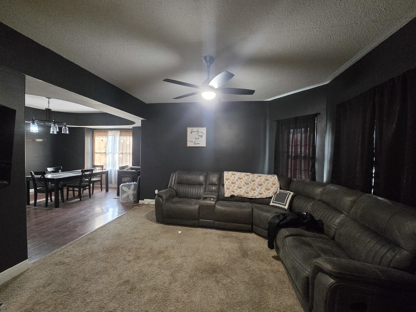 212 North Hunt Street Melvin, IL 60952 - Photo 5 of 43 a living room with furniture and a flat screen tv
