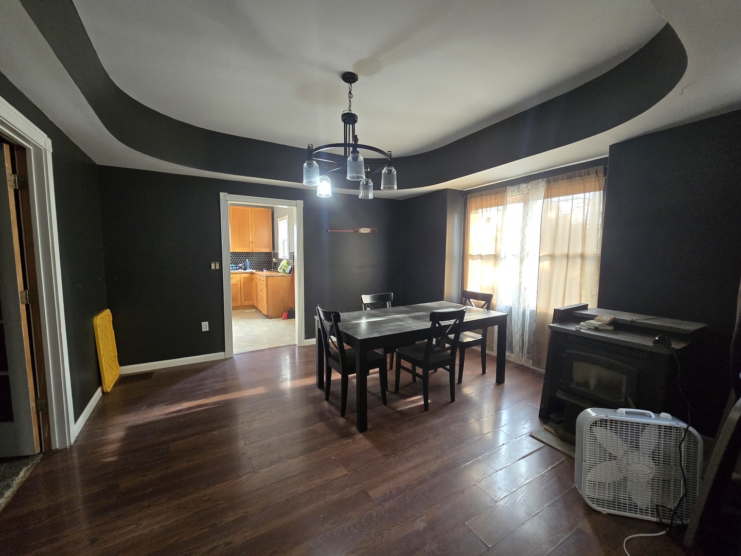 212 North Hunt Street Melvin, IL 60952 - Photo 8 of 43 a view of a dining room with furniture window and wooden floor
