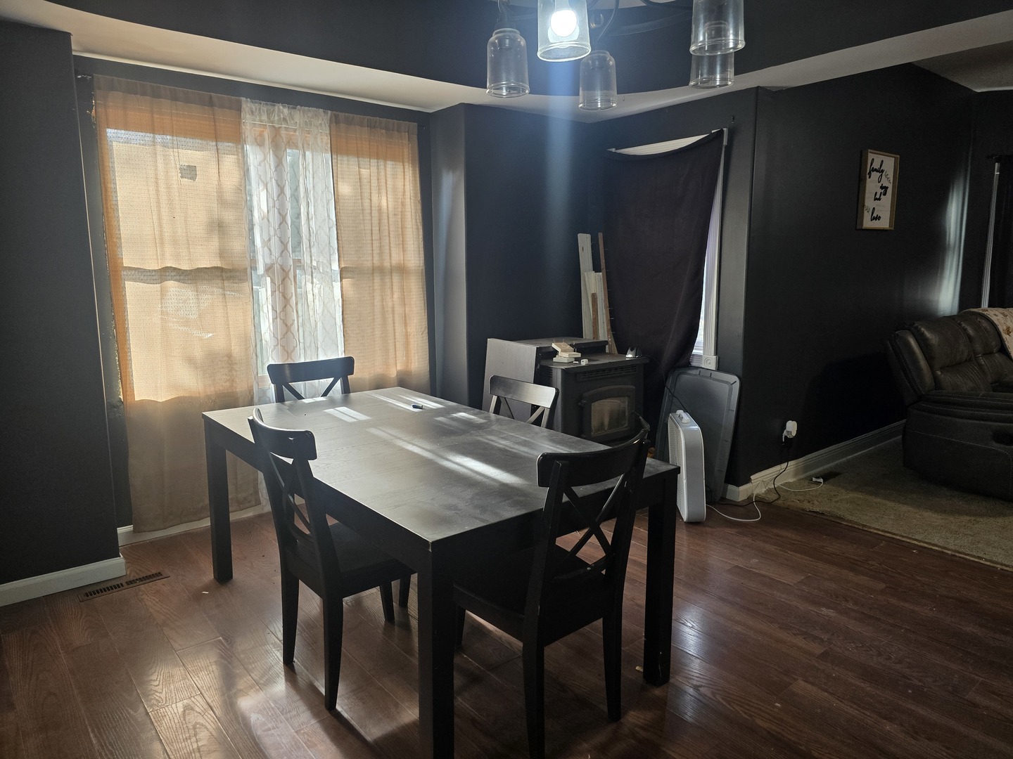 212 North Hunt Street Melvin, IL 60952 - Photo 10 of 43 a view of a dining room with furniture window and wooden floor
