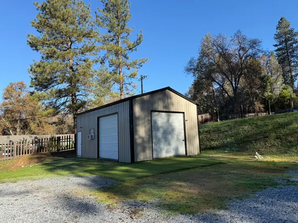 a fire hydrant in the middle of a field