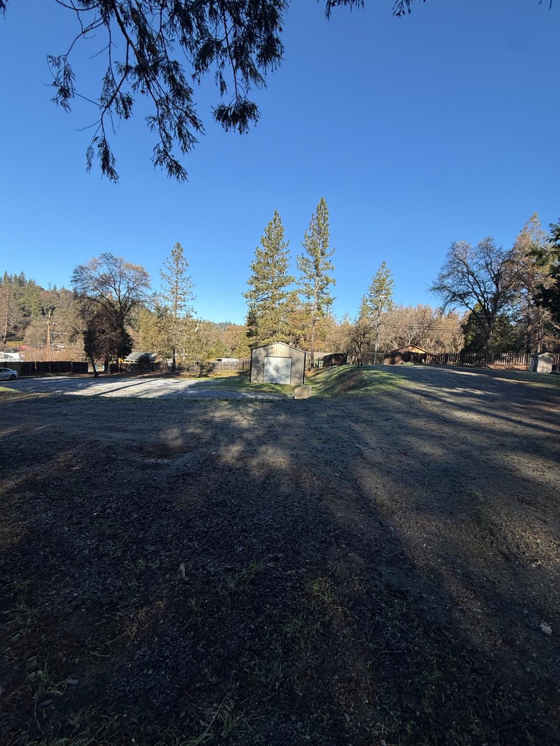 4876 Black Oak Mine Road Garden Valley, CA 95633 - Photo 23 of 31 a view of a of a house with a yard