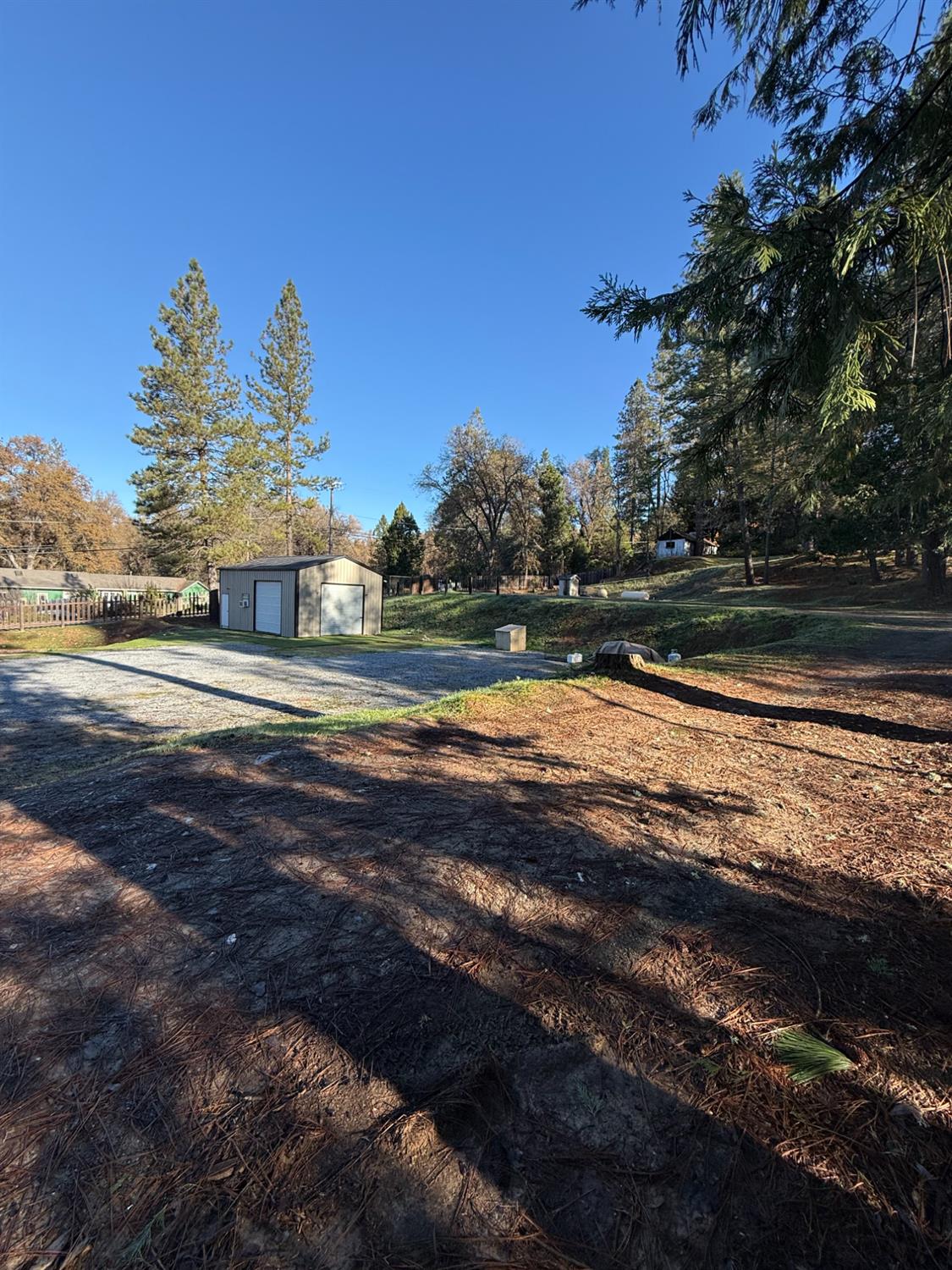 4876 Black Oak Mine Road Garden Valley, CA 95633 - Photo 29 of 31 a view of a yard with a house