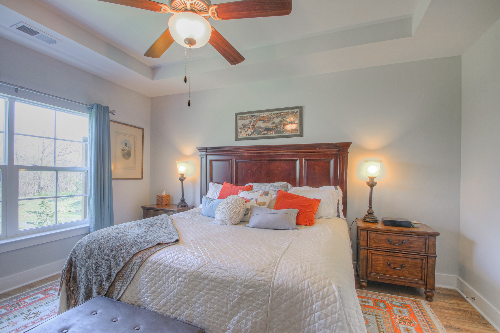 5042 Gracious Drive Franklin, TN 37064 - Photo 6 of 14 a bedroom with a bed and a chandelier