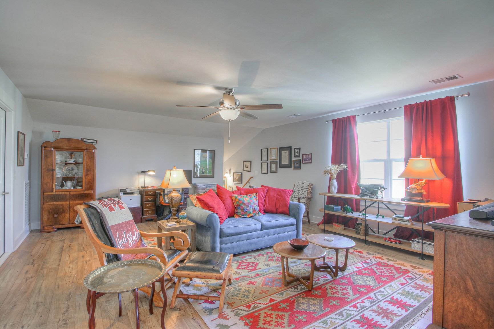 5042 Gracious Drive Franklin, TN 37064 - Photo 9 of 14 a living room with furniture and wooden floor