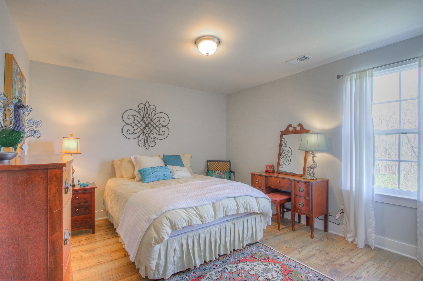 5042 Gracious Drive Franklin, TN 37064 - Photo 10 of 14 a bedroom with double bed and a window