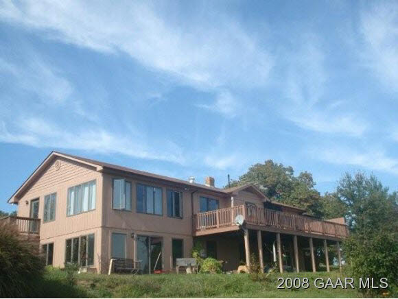 1177 Barrenridge Road Fishersville, VA 22939 - Photo 1 of 12 a front view of residential houses with yard and trees