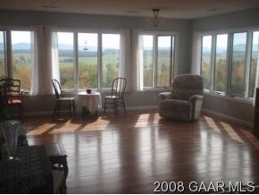 1177 Barrenridge Road Fishersville, VA 22939 - Photo 5 of 12 a living room with couches and a large window with outer view