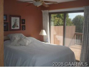 1177 Barrenridge Road Fishersville, VA 22939 - Photo 8 of 12 a bedroom with a bed and a large window