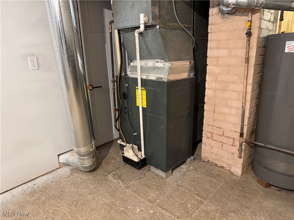 1139 Kessel Avenue Akron, OH 44310 - Photo 11 of 36 Utilities with water heater and heating unit