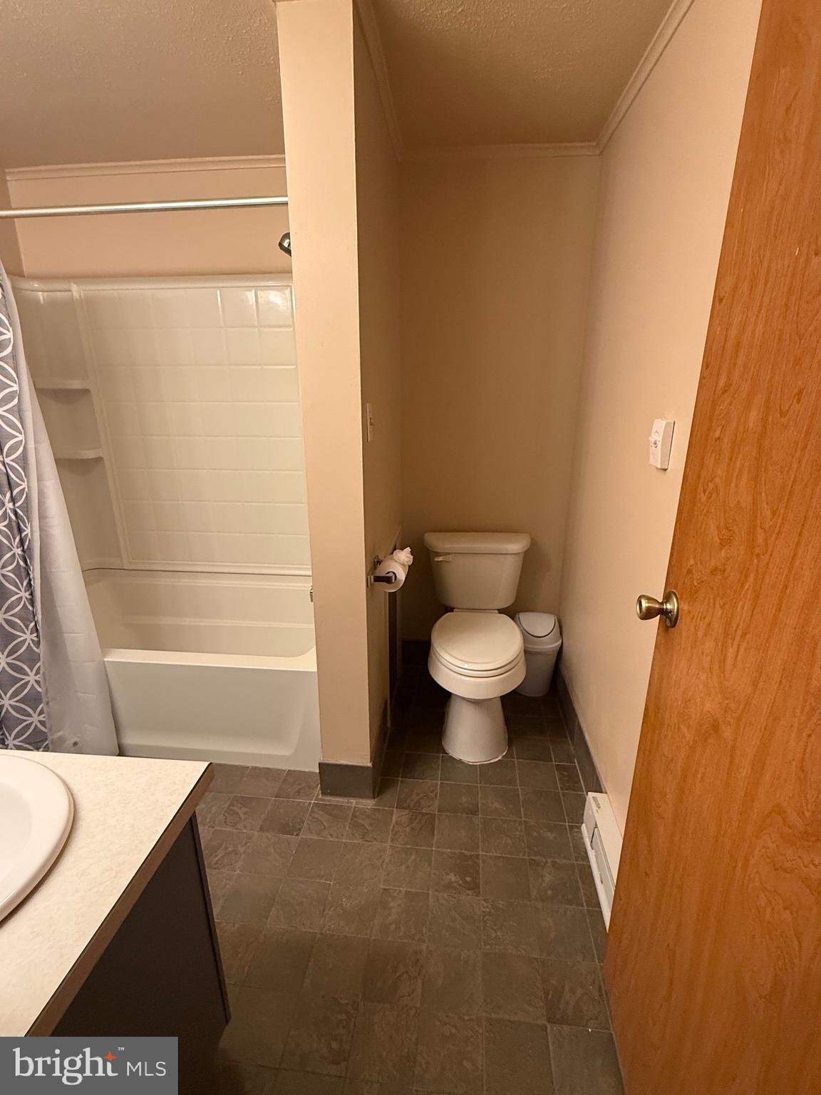 1521 Hickstown Road Sicklerville, NJ 08081 - Photo 12 of 28 a bathroom with a toilet and a shower