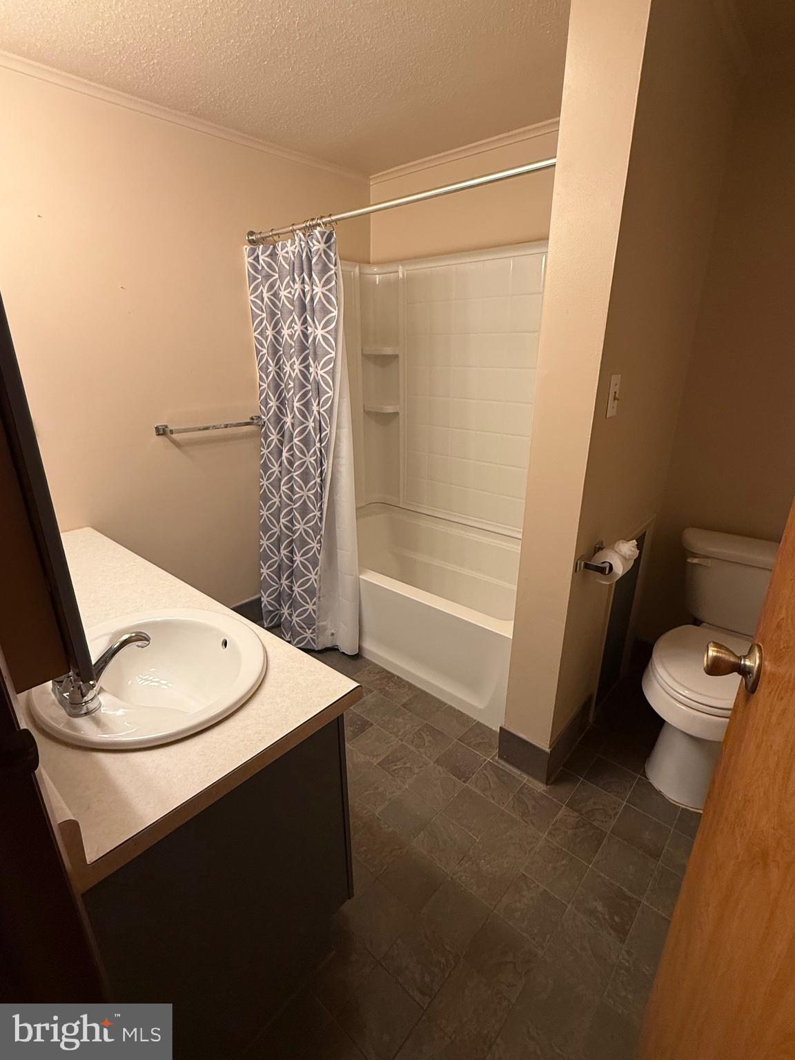 1521 Hickstown Road Sicklerville, NJ 08081 - Photo 13 of 28 a bathroom with a sink a toilet and shower