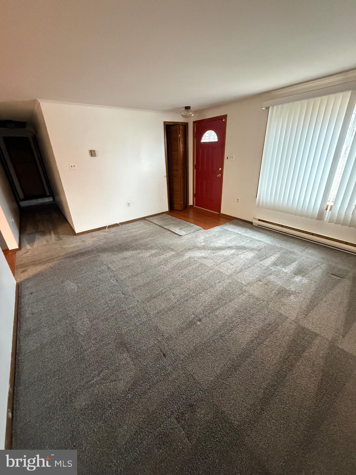 1521 Hickstown Road Sicklerville, NJ 08081 - Photo 3 of 28 a view of an empty room with windows