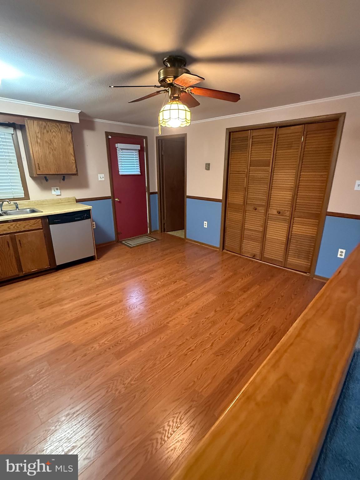 1521 Hickstown Road Sicklerville, NJ 08081 - Photo 7 of 28 a view of a livingroom with a furniture and a ceiling fan