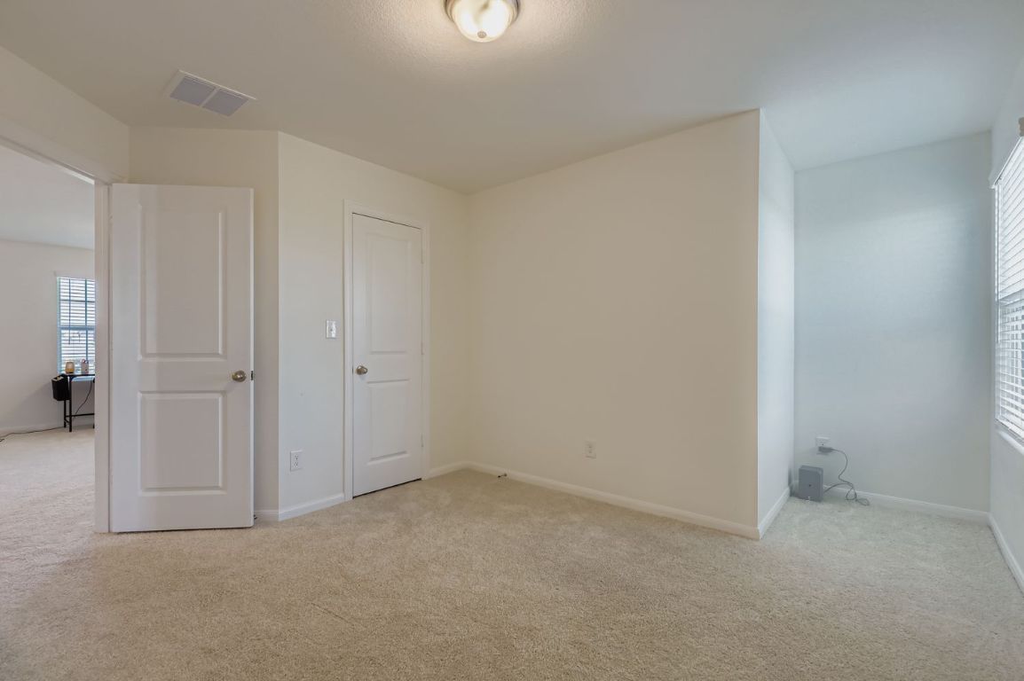 157 LT Rusty Drive Jarrell, TX 76537 - Photo 19 of 26 an empty room with closet area