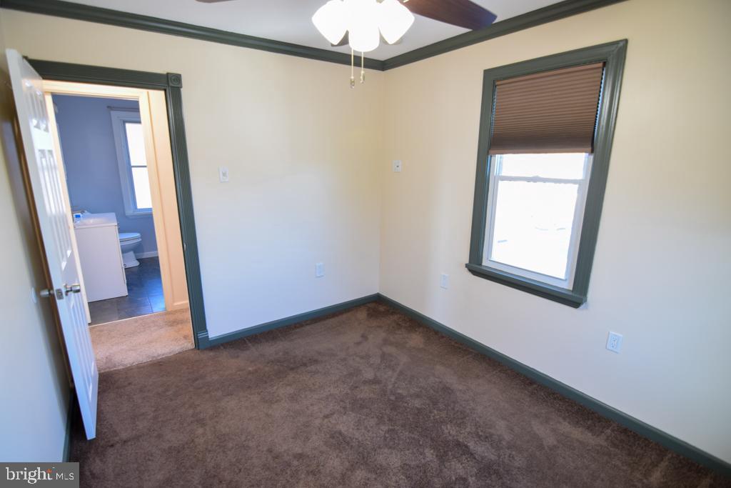 1071 West Bristol Road Warminster, PA 18974 - Photo 27 of 34 an empty room with a mirror